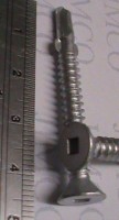 image displays detaial of a decking screw timber to metal